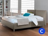 Letto matrimoniale contenitore Noctis modello London bed con rete a doghe, testata a cuscinoni e piedini sollevati per facilitare la pulizia. Disponibile anche in misura King Size